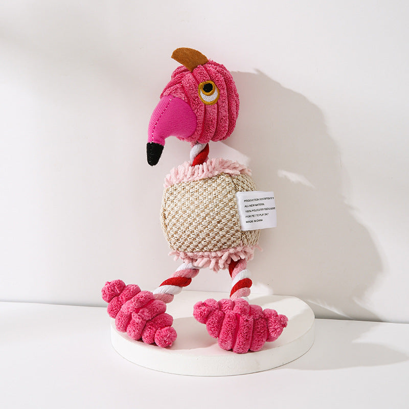 Pink plush flamingo dog toy