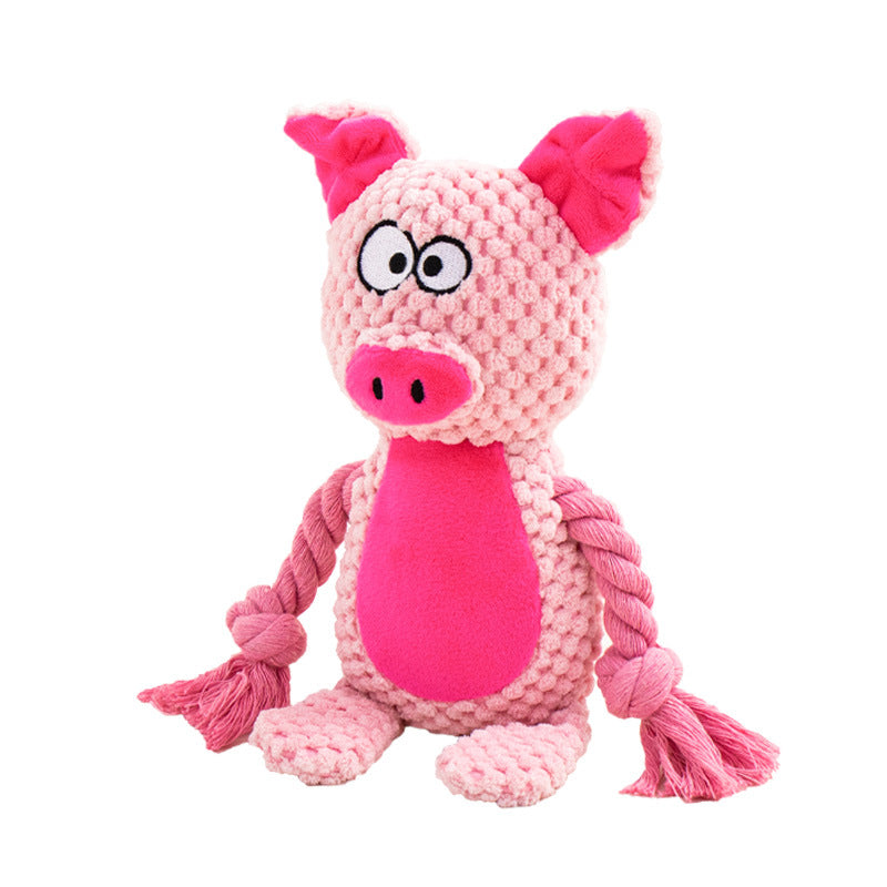 Pink pig plush dog toy with rope limbs