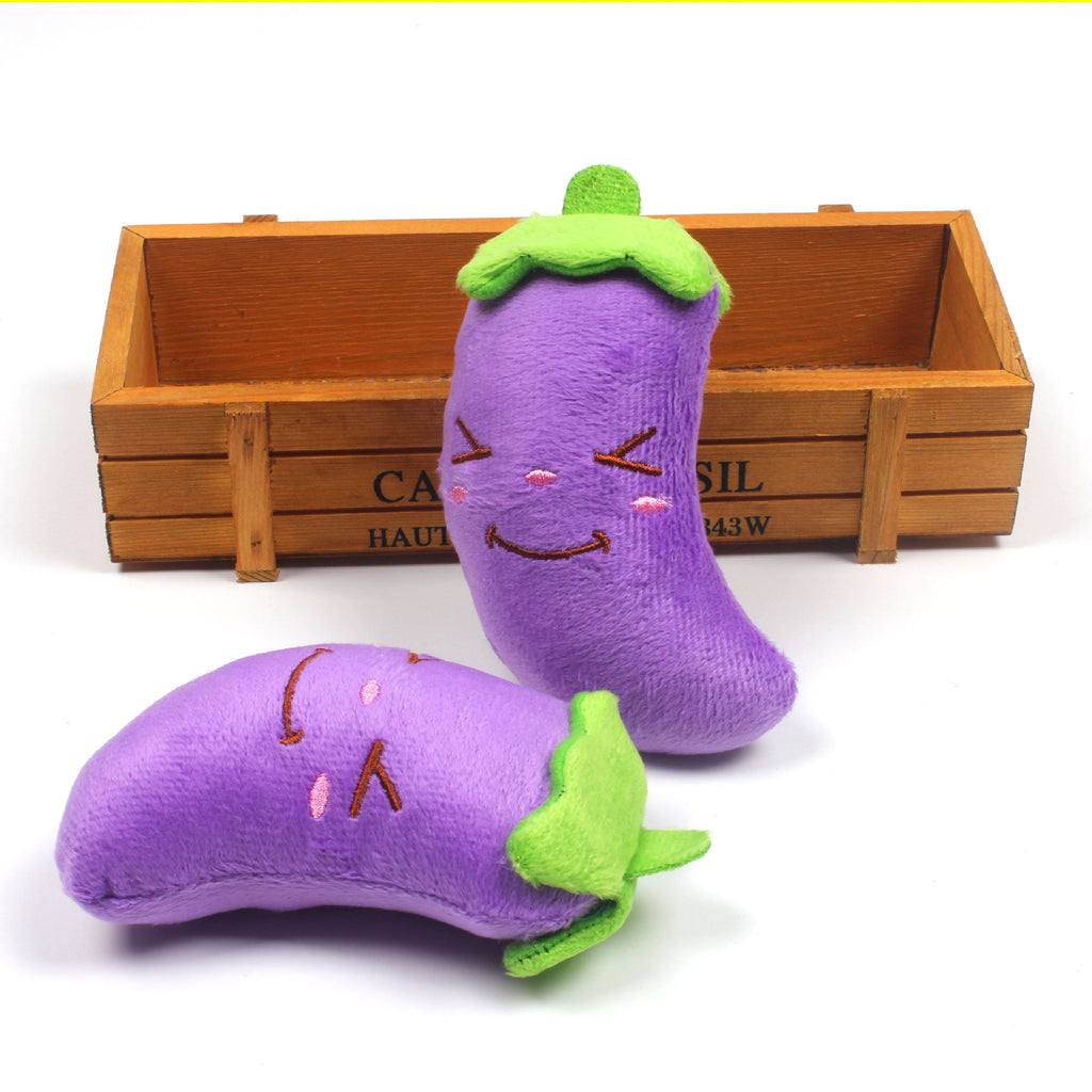 Eggplant plush toys, standing and lying down