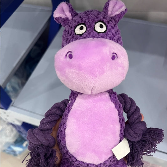 Purple hippo plush dog toy, close-up photo